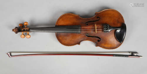 A cased German viola and bow. Label for Giovan Paolo Magini, 36.75cm.
