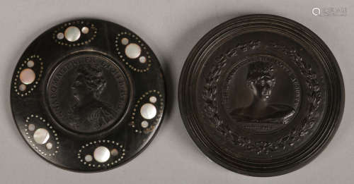 Two commemorative carved ebony paperweights. One with a portrait of Princess Charlotte and the other