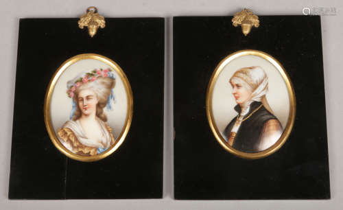 A pair of 19th century KPM style portrait miniatures in ebonized frames. One depicting a nun and the