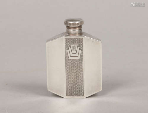An Art Deco silver plated hip flask by James Dixon & Sons. With engine turned engraving and threaded