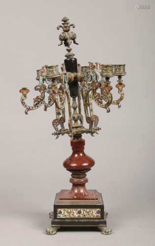 An early 20th century French bronze, marble and slate six branch candelabra decorated with champleve