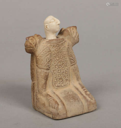 A Bactrian carved stone two piece idol with animal mask shoulder protrusions, 11cm.