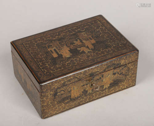 A 19th century lacquered work box with hinged cover. Black ground and painted with chinoiserie