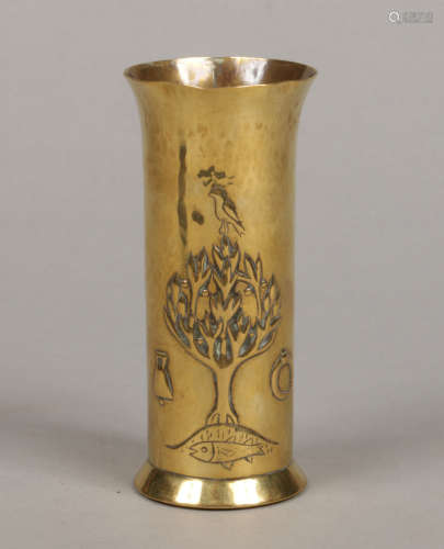 A Keswick School of Industrial Arts planished brass cylindrical vase. Embossed with a bird, tree,