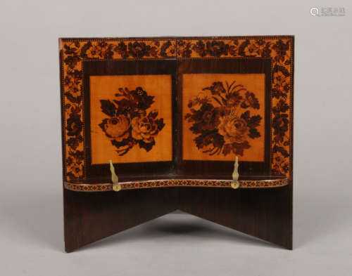 A Victorian rosewood and Tunbridge inlaid book stand, 24cm high.Condition report intended as a guide