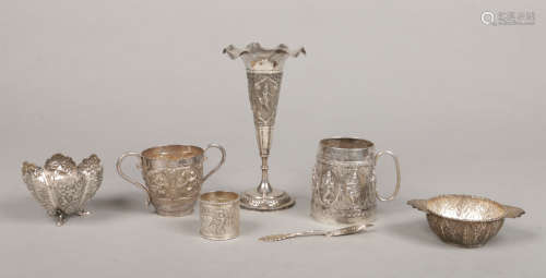 Seven Eastern white metal objects, mainly Indian. With repousse decoration depicting figures and