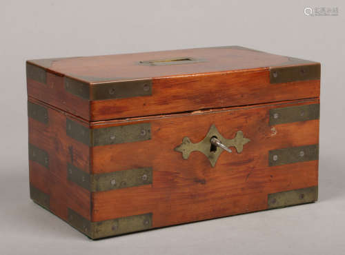 A 19th century yew wood campaign box with brass mounts, 21.5cm wide. Condition report intended as