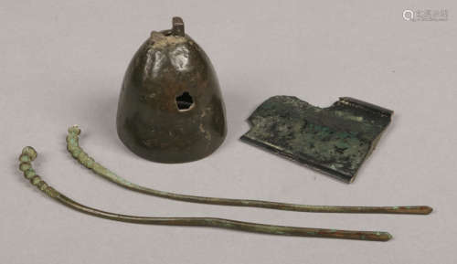Tang and Han Dynasty excavated bronze finds. A bell, hair pin and a section of a sword blade.