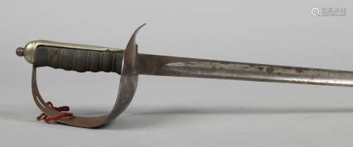 A World War I British Army Infantry pattern officers sword. With closed guard engraved with a George