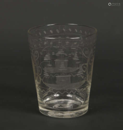 An English glass tumbler engraved with two cartouches each containing a turreted fort between two