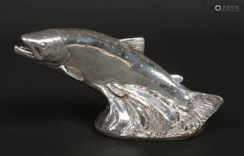 A filled silver model of a leaping salmon by Camelot Silverware Ltd. Assayed Sheffield 2018, 24.