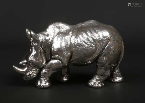 A filled silver model of a rhinoceros by Styles Silver. Assayed Sheffield 2019, 20cm long. Condition