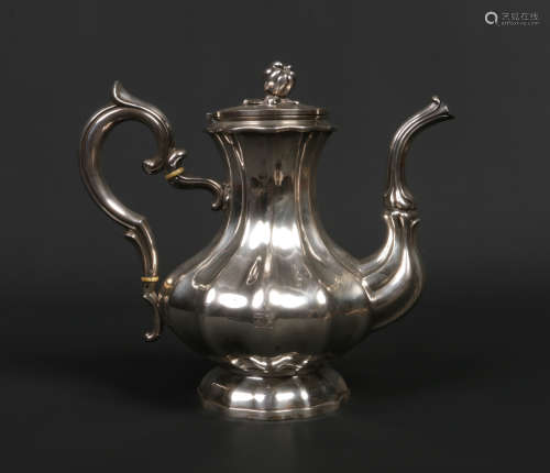 A French silver coffee pot of reeded baluster form. With naturalistic vegetable formed finial,