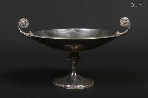 A George V silver tazza by James Dixon & Sons Ltd.  With scrolling handles having lion mask