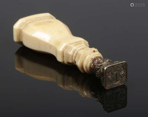 A Napoleonic desk seal with carved ivory handle. The matrix with fouled anchor and initials S. S.