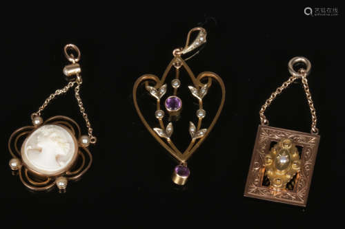 An Edwardian 9 carat gold quatrefoil cameo pendant set with seed pearls and two other Edwardian