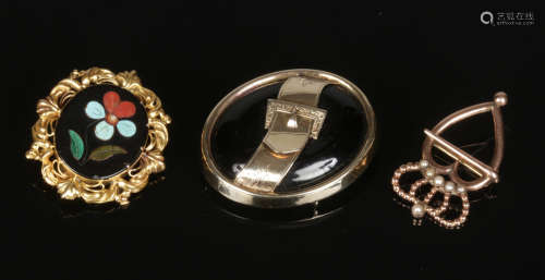 Three Victorian gold brooches. Pietra dura, jet and coronet heart brooch set with seed pearls.