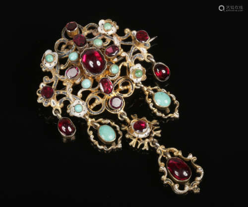 A 19th century Austro Hungarian enamelled silver gilt drop brooch set with faceted and cabochon