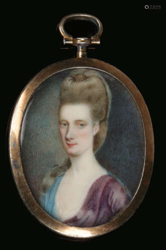 An English portrait miniature of a lady in yellow metal pendant mount c.1680-1730, 36mm x 29mm.