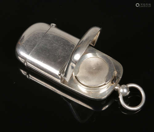 A Victorian silver combination vesta case and sovereign holder by Joseph Walton. Engraved with a