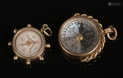 Two 9 carat gold mounted compass pocket watch fobs. Condition report intended as a guide only.Good