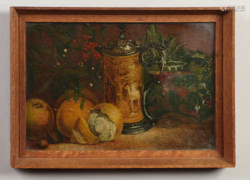 An early 20th century small oak framed still life oil on board. Fruit, holly, carafe and a wine