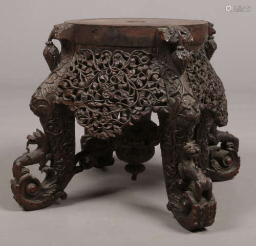 A 19th century Anglo Indian carved hardwood plinth. With pierced foliate frieze, central acanthus