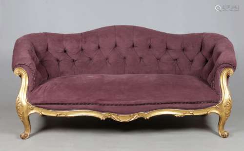 A William IV Rococo style giltwood three seater settee possibly by Gillows of Lancaster. With deep
