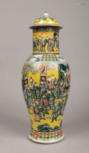 A Chinese Qing Dynasty large famille jaune baluster vase and cover. With key fret and chequered