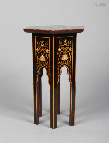 A Moroccan inlaid hexagonal side table. Decorated with stylized flowers with specimen woods and