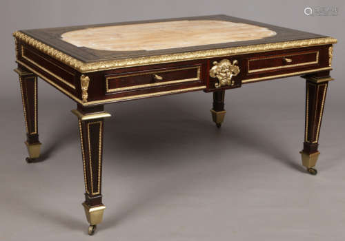 A fine 19th century rosewood two drawer desk with tortoiseshell boulle inlay. Having ormolu acanthus