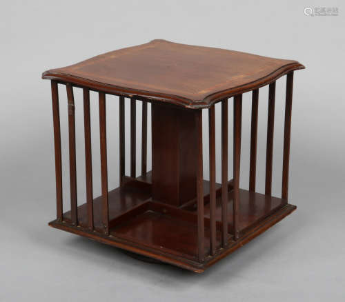An Edwardian mahogany rotating table top bookcase crossbanded in satinwood, 34cm high.Condition