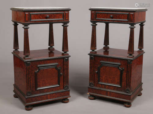 A pair of 19th century French bur yew marble top bedside cabinets. With ebonized mouldings and