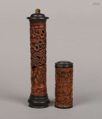 Two Chinese carved and stained boxwood scroll jars / parfumier with horn capitals. Largest 27cm.