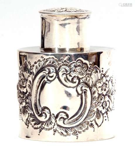 Edward VII cylindrical canister with pull off cover and decorated with embossed C-scroll floral