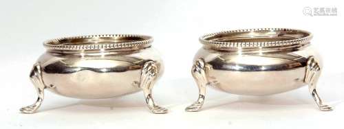 Two Victorian cauldron salts, each of polished form with beaded rims on three cast and applied feet,