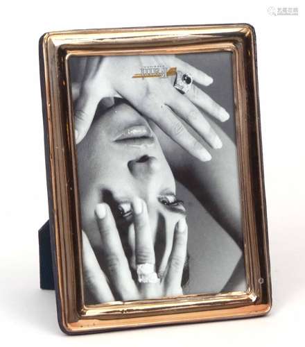 20th century white metal mounted easel backed photograph frame of plain and polished rectangular