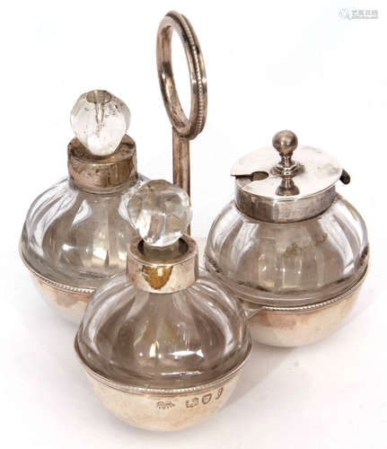 Victorian three piece breakfast cruet stand of trefoil form with central ring carry handle and