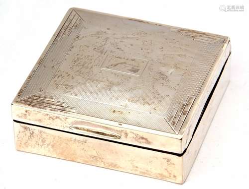 George V table cigarette box of square form, the hinged cover with engine turned decoration and