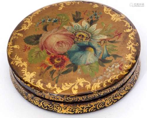 Late 19th century papier mache snuff box of circular form with pull off cover decorated with gilt