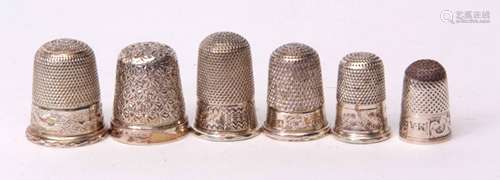 Mixed Lot: six various thimbles all of graduated sizes and comprising three hallmarked and three