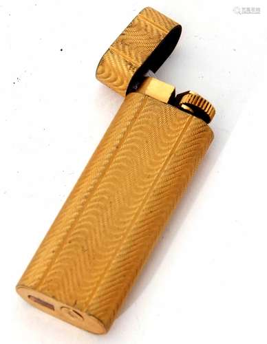 Late 20th century gold plated gas lighter, Cartier - Paris, 34093 D, the oval gilt case with all