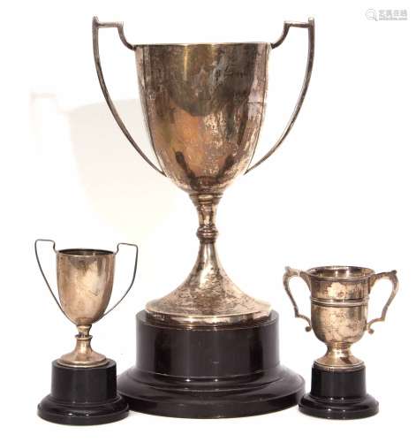 Mixed Lot: comprising three various hallmarked silver two-handled trophy cups in goblet form,