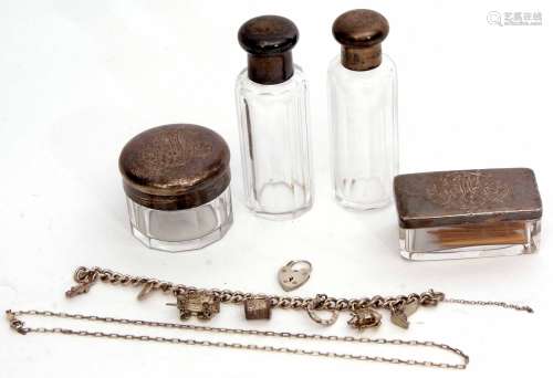 Mixed Lot: comprising four Continental white metal and clear glass toiletry bottles comprising three