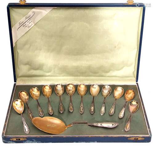 Cased Continental silver and gilt dessert service comprising 12 small spoons, each with gilt bowls