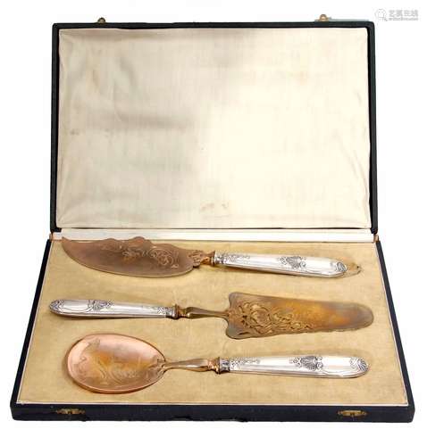 Continental cased three piece serving set, each with cast and applied handles to a gilt finished and