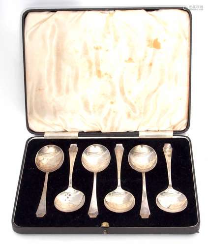 Cased set of six coffin topped dessert spoons, each with polished circular bowls, length 13cm,