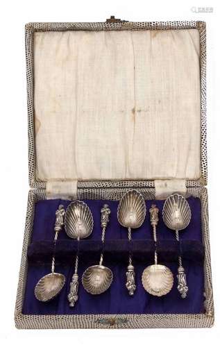 Cased set of Edward VII figural coffee spoons, each with cast and applied finials, twisted stems and