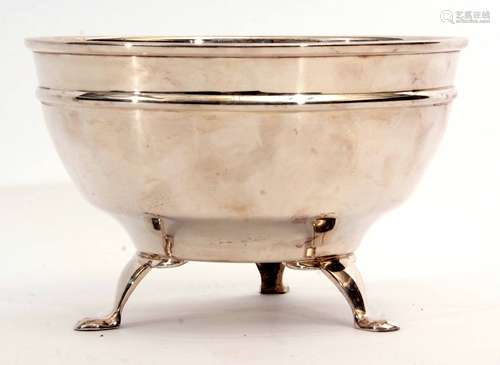 Early 20th century electro-plated bowl of polished circular form raised on three cast and applied