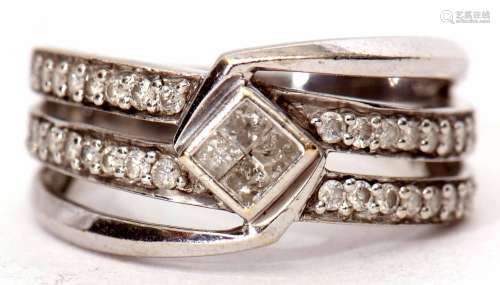 Precious metal and diamond cluster ring, the centre features four small princes cut diamonds,